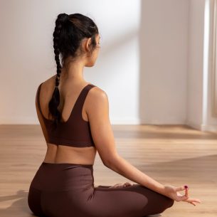woman-doing-yoga-cleaning-chakra (1)